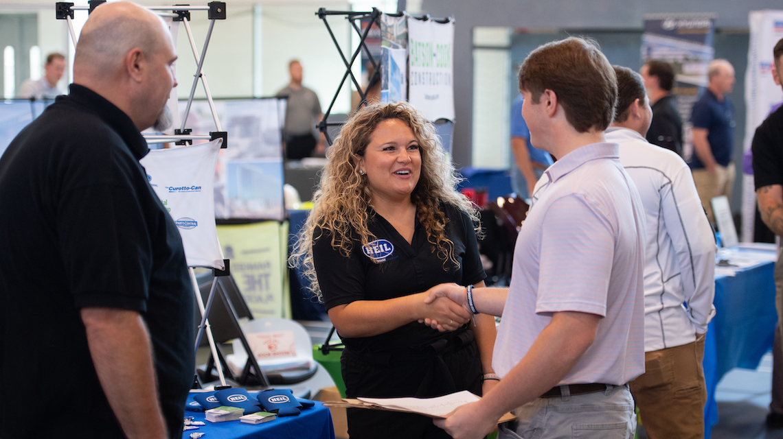 Students and employers at career fair